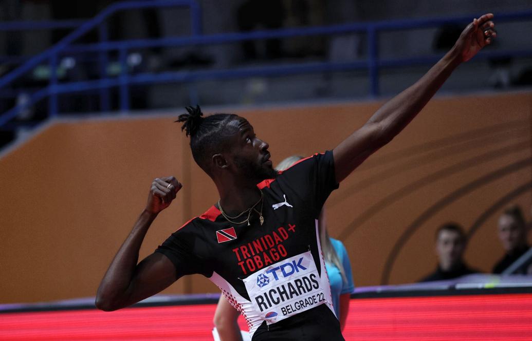 FLASHBACK: Jereem “The Dream” Richards honours his friend and teammate Deon Lendore with the deceased quarter-miler’s signature archer celebration following his 2022 World Athletics Indoor Championship men’s 400 metres triumph in Belgrade, Serbia. Richards clocked a championship and national indoor record time of 45 seconds flat to become Trinidad and Tobago’s first-ever World Indoor Championship gold medallist. —Photo: GETTY IMAGES FOR WORLD ATHLETICS - Maja Hitij (Image obtained at trinidadexpress.com)