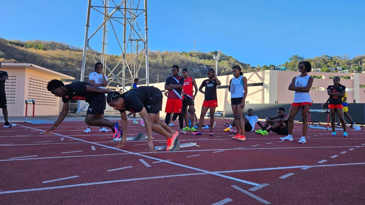 Team TTO sprinters exit the blocks with their peers looking on in a final training session yesterday before the start of the Carifta Games at the Kirani James Athletics Stadium in St George’s Grenada, today.  Jovan Ravello (Image obtained at guardian.co.tt)
