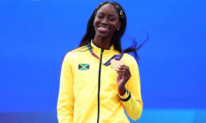 Dejanea Oakley of Jamaica poses with her gold medal after winning the women’s 400m at the Commonwealth Games in Scotland. (Image obtained at guardian.co.tt)
